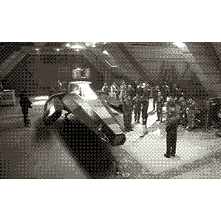 A group of people gathered around a sci-fi fighter jet.